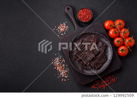Snacks or jerky, beef slice meat dried, dehydrated. Beef snack Snacks or jerky, beef slice meat dried, dehydrated. Beef snack 129992509