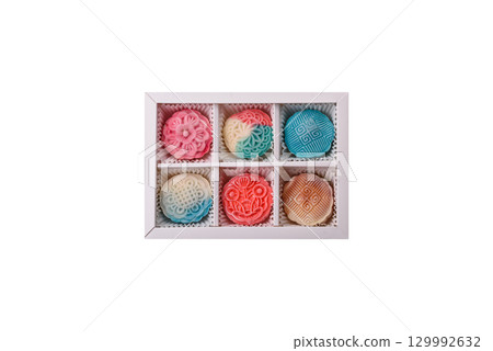 Chinese mooncake is an Asian sweet dessert. Asian mooncake as a background for your design Chinese mooncake is an Asian sweet dessert. Asian mooncake as a background for your design 129992632