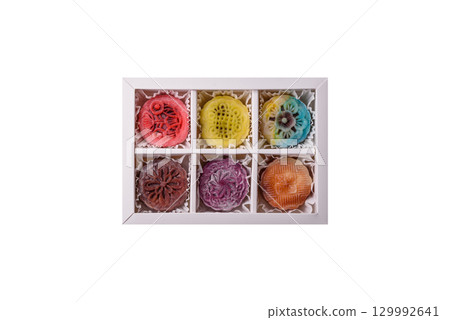 Chinese mooncake is an Asian sweet dessert. Asian mooncake as a background for your design 129992641