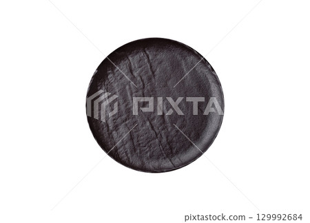 Empty round black plate for food, risotto or pasta. Empty plate on dark background Empty round black plate for food, risotto or pasta. Empty plate on dark background 129992684