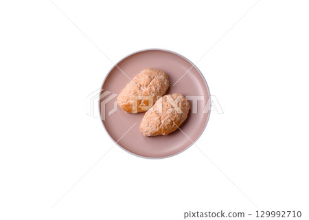 Steamed fish or chicken cutlets or meatballs with salt and spices. Fish cutlets 129992710
