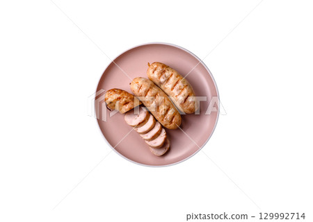 Grilled chicken or beef sausages, a hot meat dish. Barbecued sausages Grilled chicken or beef sausages, a hot meat dish. Barbecued sausages 129992714