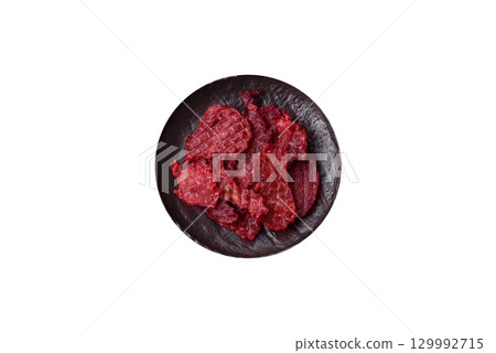 Jerky or dried chicken and cherry snacks. Dehydrated, dried snacks for beer Jerky or dried chicken and cherry snacks. Dehydrated, dried snacks for beer 129992715