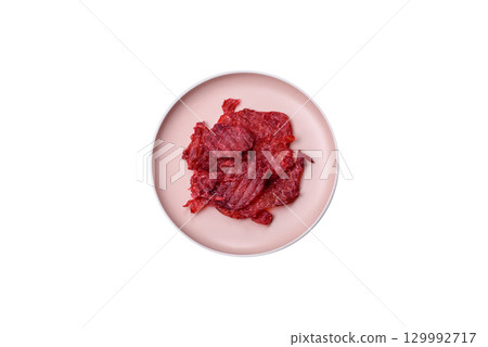 Jerky or dried chicken and cherry snacks. Dehydrated, dried snacks for beer Jerky or dried chicken and cherry snacks. Dehydrated, dried snacks for beer 129992717