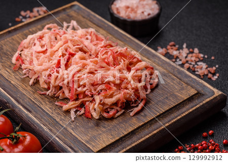 Food, dried squid in shavings or chopped as snacks or jerky. Snack dried squid for beer 129992912