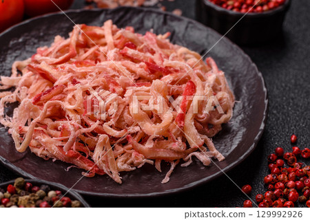 Food, dried squid in shavings or chopped as snacks or jerky. Snack dried squid for beer 129992926