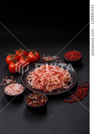 Food, dried squid in shavings or chopped as snacks or jerky. Snack dried squid for beer 129992932