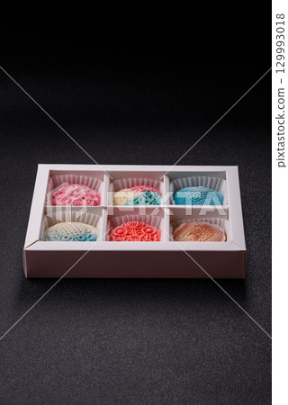 Chinese mooncake is an Asian sweet dessert. Asian mooncake as a background for your design Chinese mooncake is an Asian sweet dessert. Asian mooncake as a background for your design 129993018