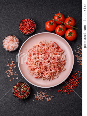 Food, dried squid in shavings or chopped as snacks or jerky. Snack dried squid for beer 129993138