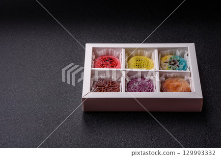 Chinese mooncake is an Asian sweet dessert. Asian mooncake as a background for your design 129993332