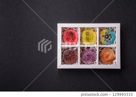 Chinese mooncake is an Asian sweet dessert. Asian mooncake as a background for your design 129993333