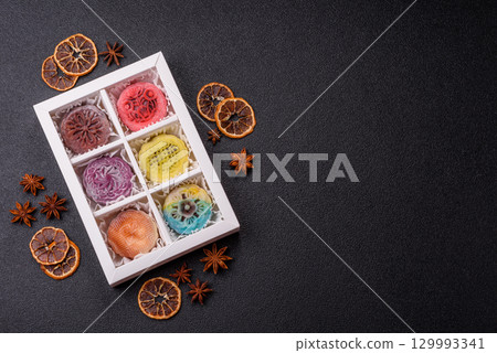 Chinese mooncake is an Asian sweet dessert. Asian mooncake as a background for your design 129993341