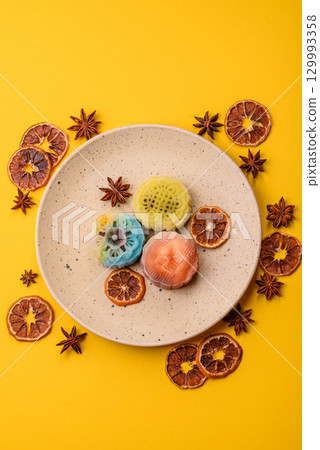 Chinese mooncake is an Asian sweet dessert. Asian mooncake as a background for your design 129993358