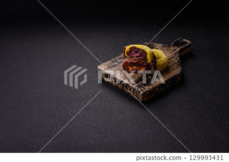 Chinese mooncake is an Asian sweet dessert. Asian mooncake as a background for your design 129993431