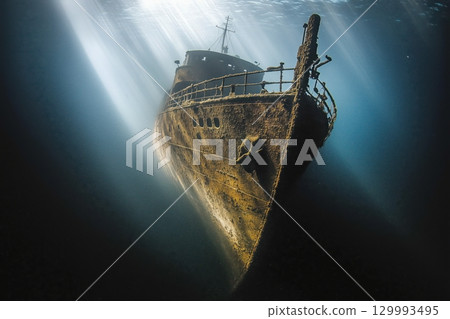A sunken ship. deep dark water 129993495