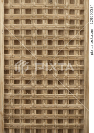 Intricate bamboo weave pattern with natural grain Intricate bamboo weave pattern with natural grain 129993584