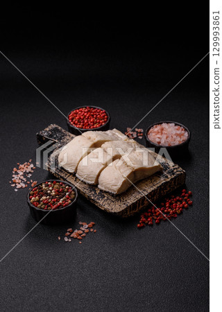 White fish fillets, seafood cooked with salt and spices. Fish fillets 129993861