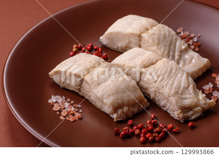 White fish fillets, seafood cooked with salt and spices. Fish fillets 129993866