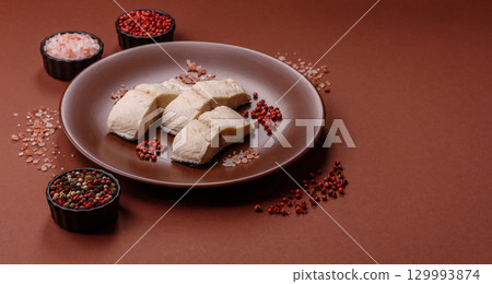 White fish fillets, seafood cooked with salt and spices. Fish fillets 129993874