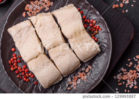 White fish fillets, seafood cooked with salt and spices. Fish fillets White fish fillets, seafood cooked with salt and spices. Fish fillets 129993887