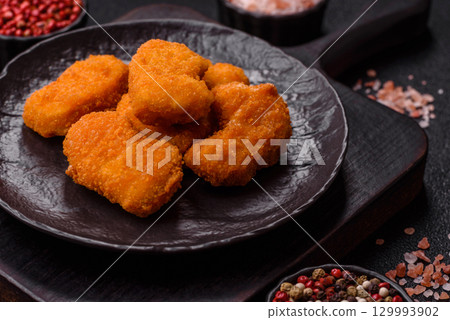 Chicken nuggets in breading, takeaway food, junk food 129993902