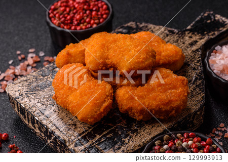 Chicken nuggets in breading, takeaway food, junk food 129993913