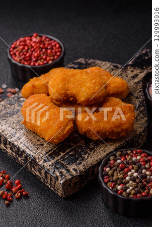 Chicken nuggets in breading, takeaway food, junk food 129993916
