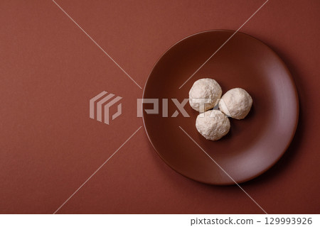 Chicken meatballs, cutlets steamed with salt and spices, a healthy meal 129993926