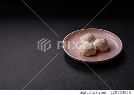 Chicken meatballs, cutlets steamed with salt and spices, a healthy meal 129993939