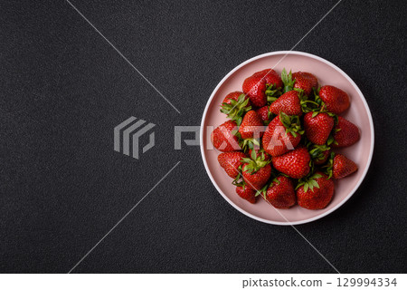 Strawberry, fresh juicy berries and fruits as background Strawberry, fresh juicy berries and fruits as background 129994334