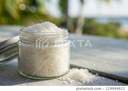 sugar scrub in a glass jar 129994611