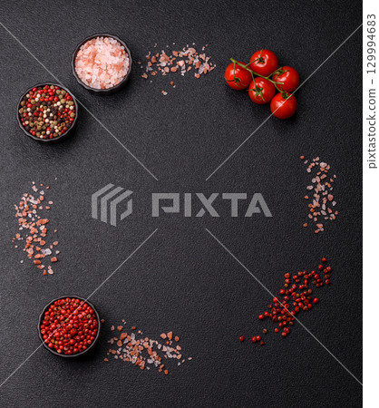 Ingredients for cooking cherry tomatoes, salt, spices and herbs 129994683