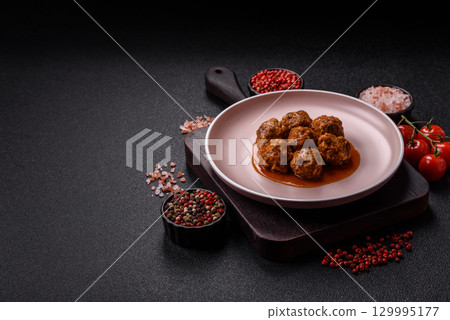 Meat, meatballs in tomato sauce, Italian food, beef or pork with salt . Meatballs with tomatoes 129995177