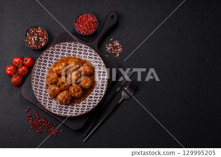 Meat, meatballs in tomato sauce, Italian food, beef or pork with salt . Meatballs with tomatoes 129995205
