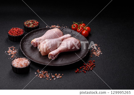 Raw chicken legs, fresh uncooked poultry meat. Chicken or turkey legs 129995265