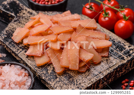 Food, dried squid in shavings or chopped as snacks or jerky. Snack dried squid for beer 129995281