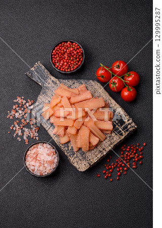 Food, dried squid in shavings or chopped as snacks or jerky. Snack dried squid for beer 129995287