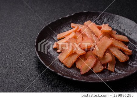 Food, dried squid in shavings or chopped as snacks or jerky. Snack dried squid for beer 129995293