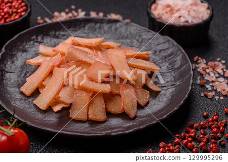 Food, dried squid in shavings or chopped as snacks or jerky. Snack dried squid for beer 129995296