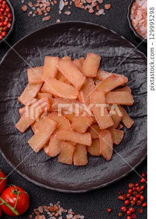 Food, dried squid in shavings or chopped as snacks or jerky. Snack dried squid for beer 129995298