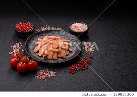 Food, dried squid in shavings or chopped as snacks or jerky. Snack dried squid for beer Food, dried squid in shavings or chopped as snacks or jerky. Snack dried squid for beer 129995300