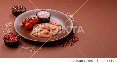 Food, dried squid in shavings or chopped as snacks or jerky. Snack dried squid for beer 129995319