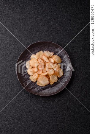 Food, dried squid in shavings or chopped as snacks or jerky. Snack dried squid for beer 129995473