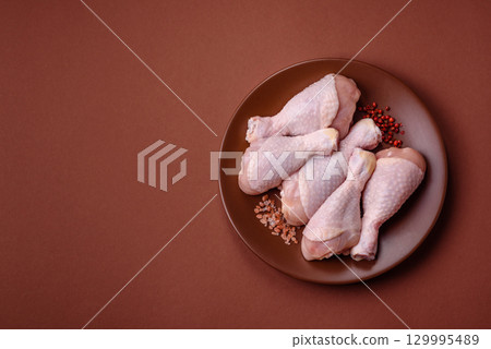 Raw chicken legs, fresh uncooked poultry meat. Chicken or turkey legs Raw chicken legs, fresh uncooked poultry meat. Chicken or turkey legs 129995489