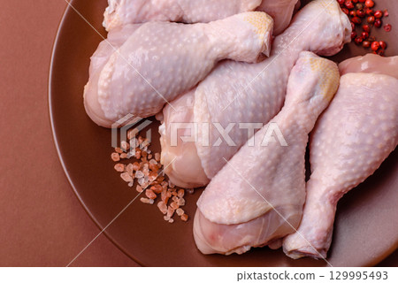 Raw chicken legs, fresh uncooked poultry meat. Chicken or turkey legs 129995493