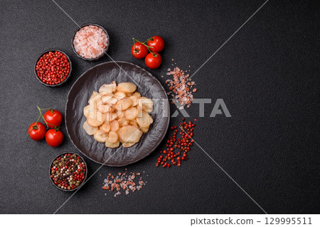 Food, dried squid in shavings or chopped as snacks or jerky. Snack dried squid for beer Food, dried squid in shavings or chopped as snacks or jerky. Snack dried squid for beer 129995511