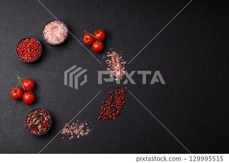 Ingredients for cooking cherry tomatoes, salt, spices and herbs 129995515