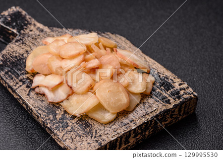 Food, dried squid in shavings or chopped as snacks or jerky. Snack dried squid for beer 129995530