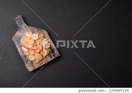 Food, dried squid in shavings or chopped as snacks or jerky. Snack dried squid for beer 129995534