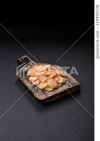 Food, dried squid in shavings or chopped as snacks or jerky. Snack dried squid for beer 129995536